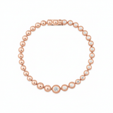 half radiance bracelet in rose gold on white background