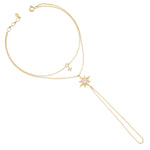 starburst chain bracelet in yellow gold on white background