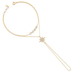 draped starburst bracelet in yellow gold on white background