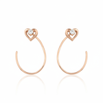 open heart hoop earrings in rose gold on white background