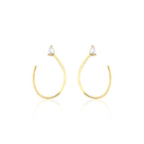 open loop earrings in yellow gold on white background