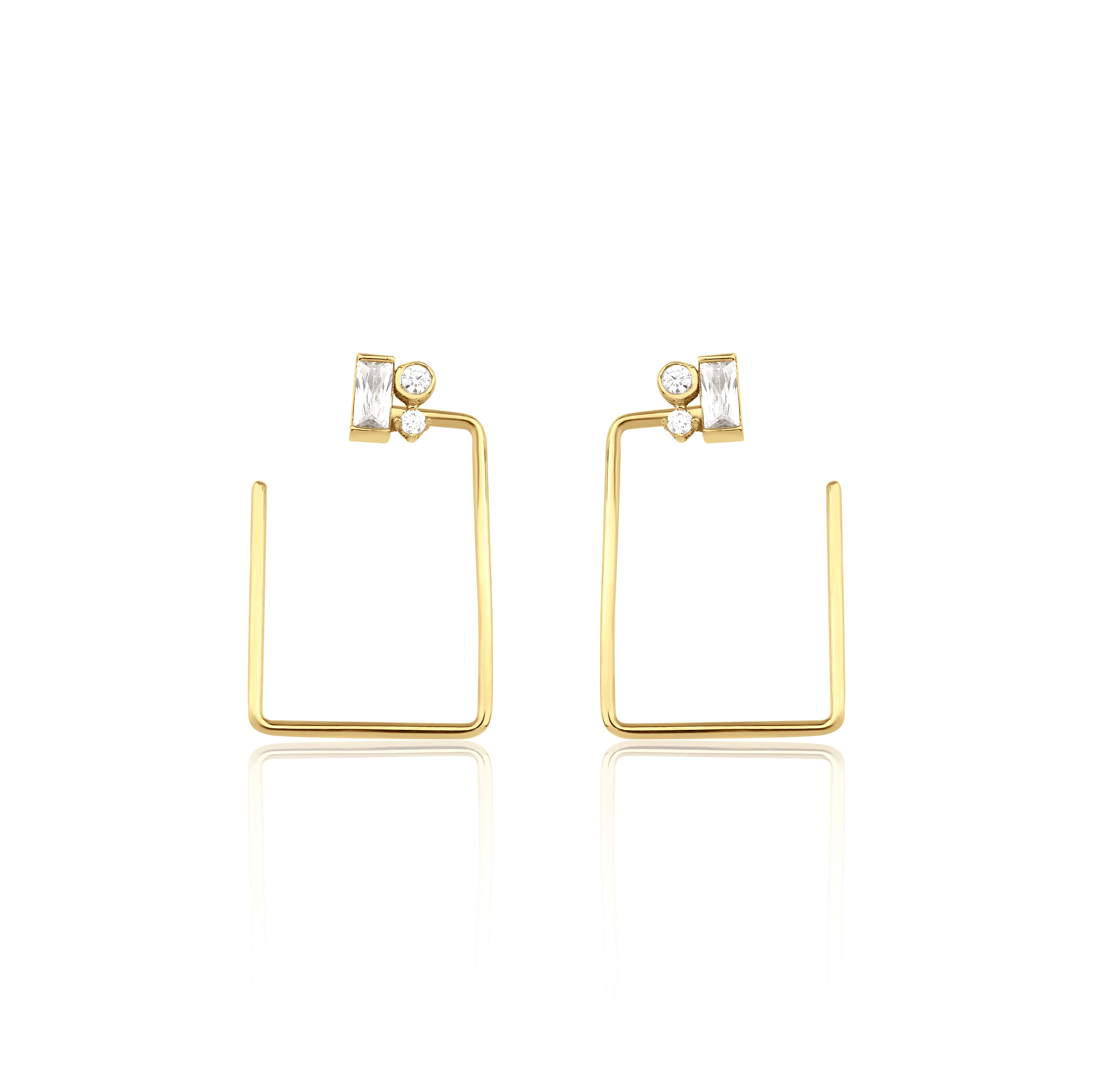 rectangle baguette earrings in yellow gold on white background