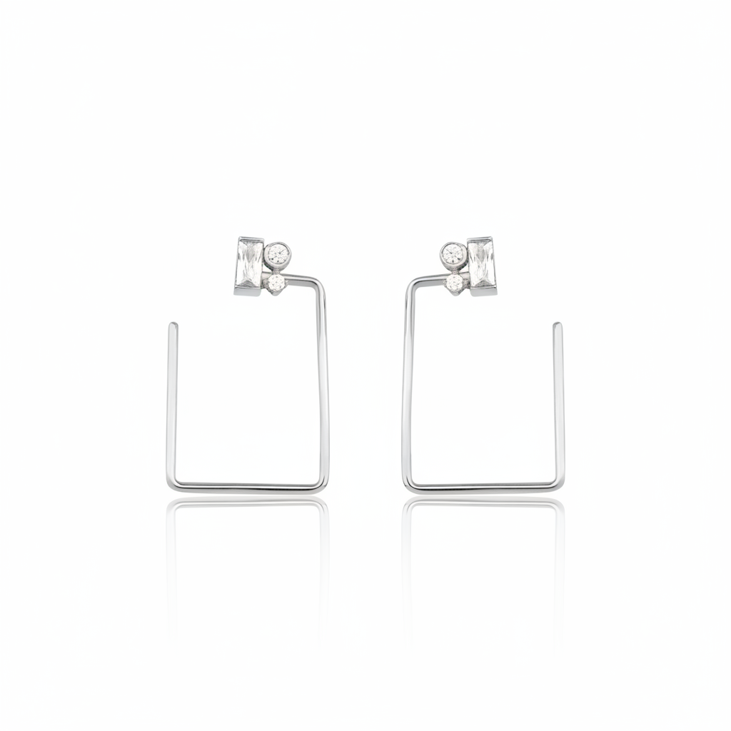 rectangle baguette earrings in white gold on white background