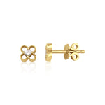 openwork clover stud earrings in yellow gold on white background