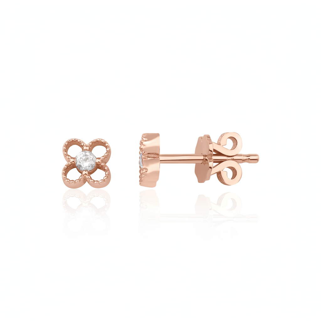 openwork clover stud earrings in rose gold on white background