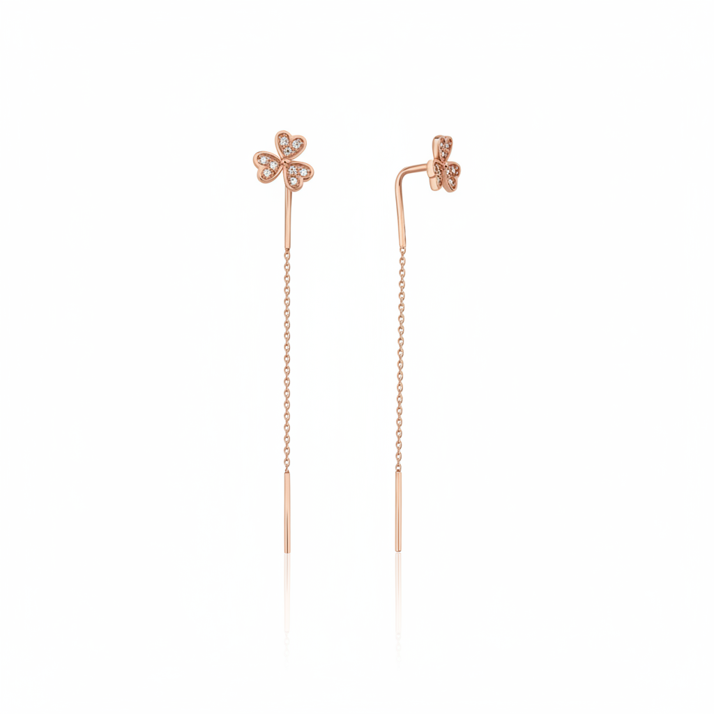rose gold clover threader earrings on white background