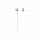 white gold clover threader earrings on white background