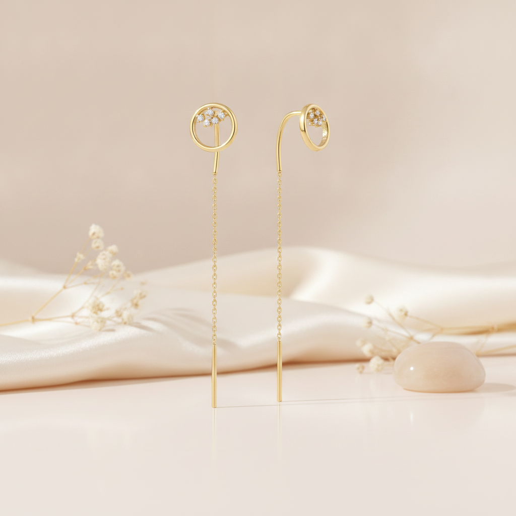 gold open circle threader earrings with a White CZ stone cluster and bar drop on a warm beige background with dried baby's breath