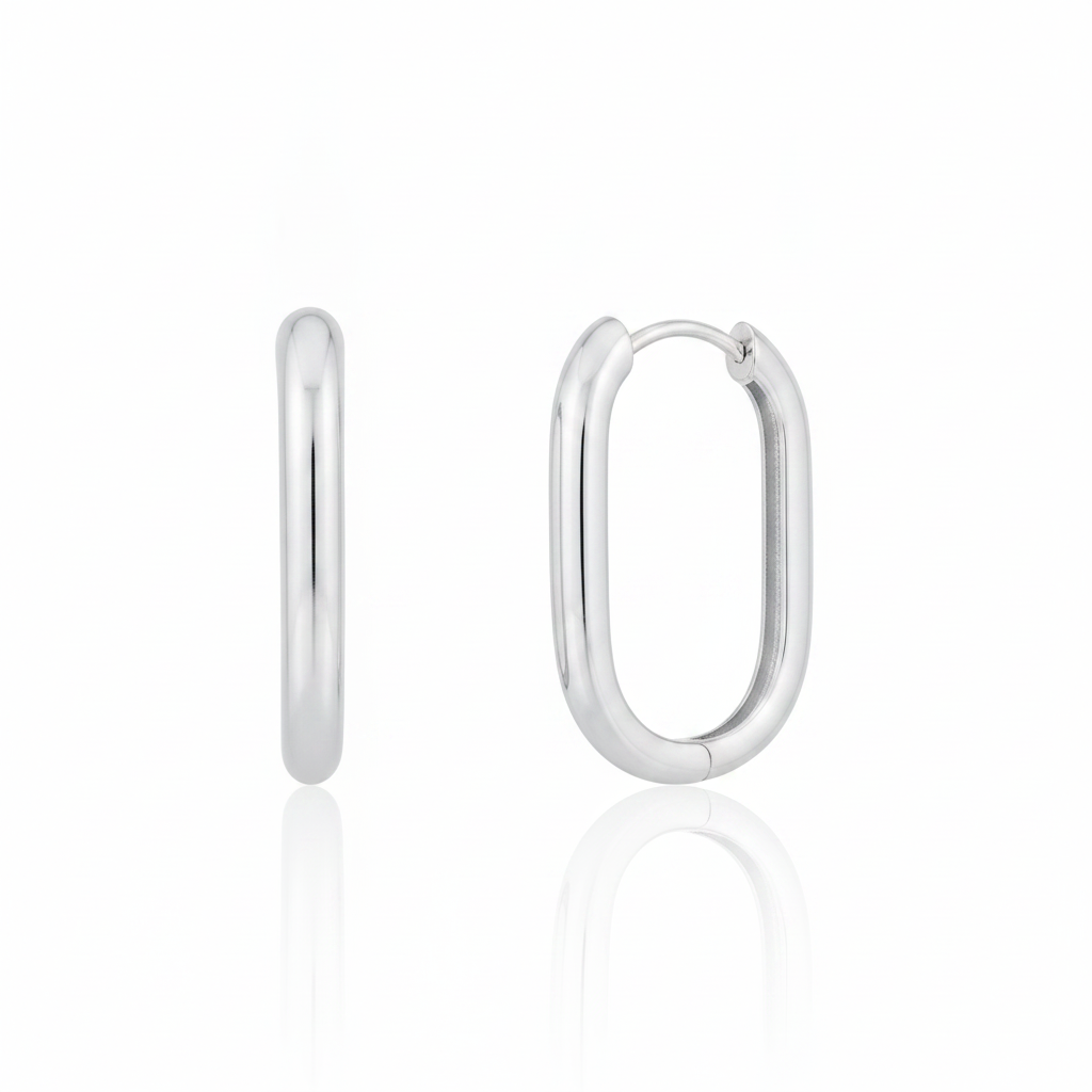 white gold oval hoop earrings on white background
