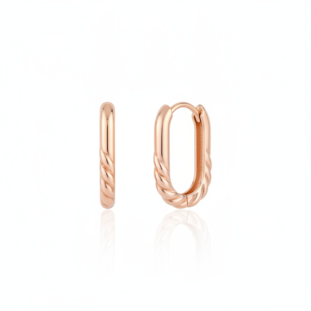 rose gold oval twist hoop earrings on white background