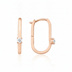 rose gold oval spark hoop earrings on white background