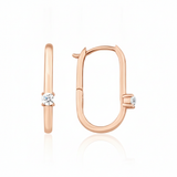 rose gold oval spark hoop earrings on white background