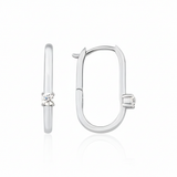 white gold oval spark hoop earrings on white background
