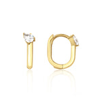 yellow gold pear drop hoop earrings on white background