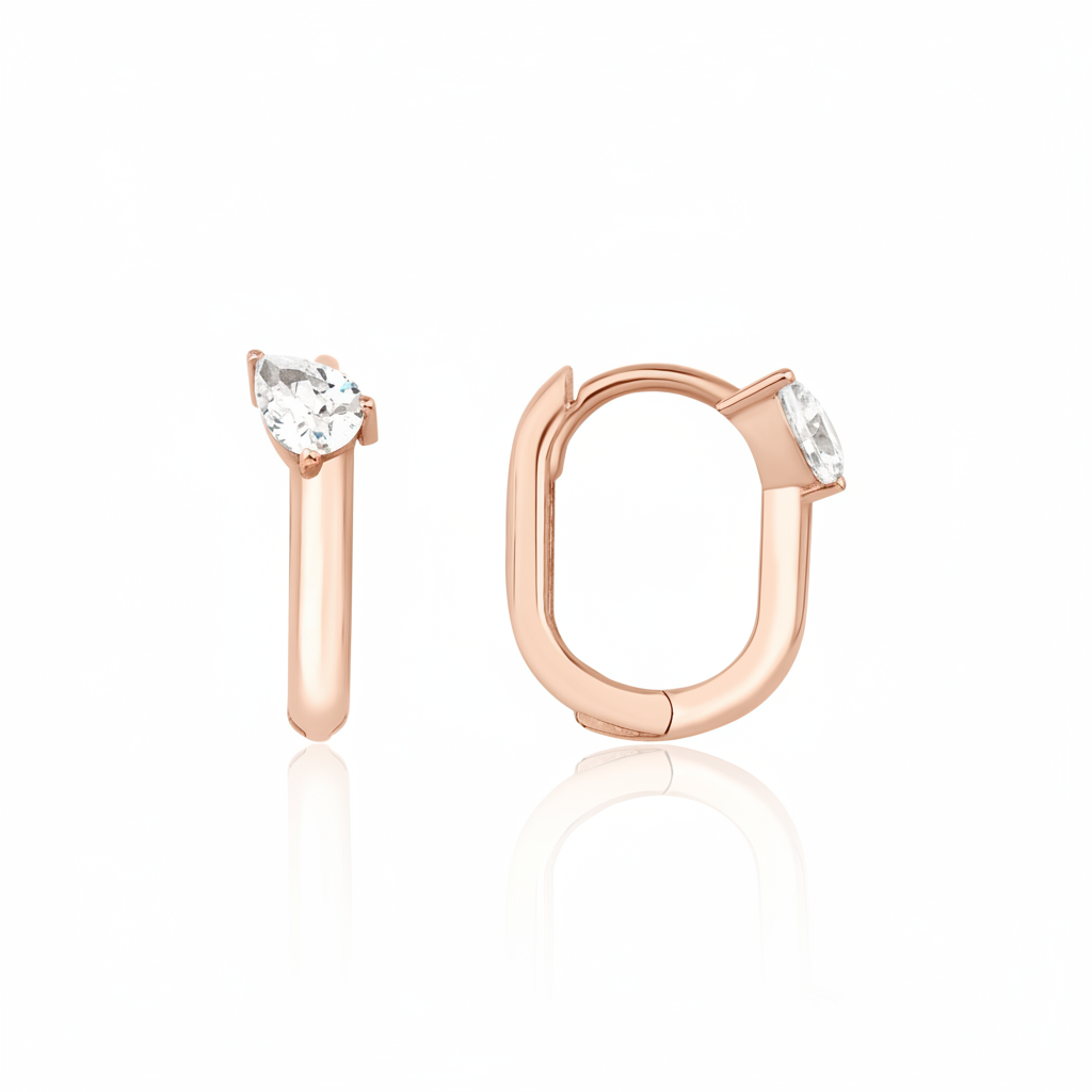 rose gold pear drop hoop earrings on white background