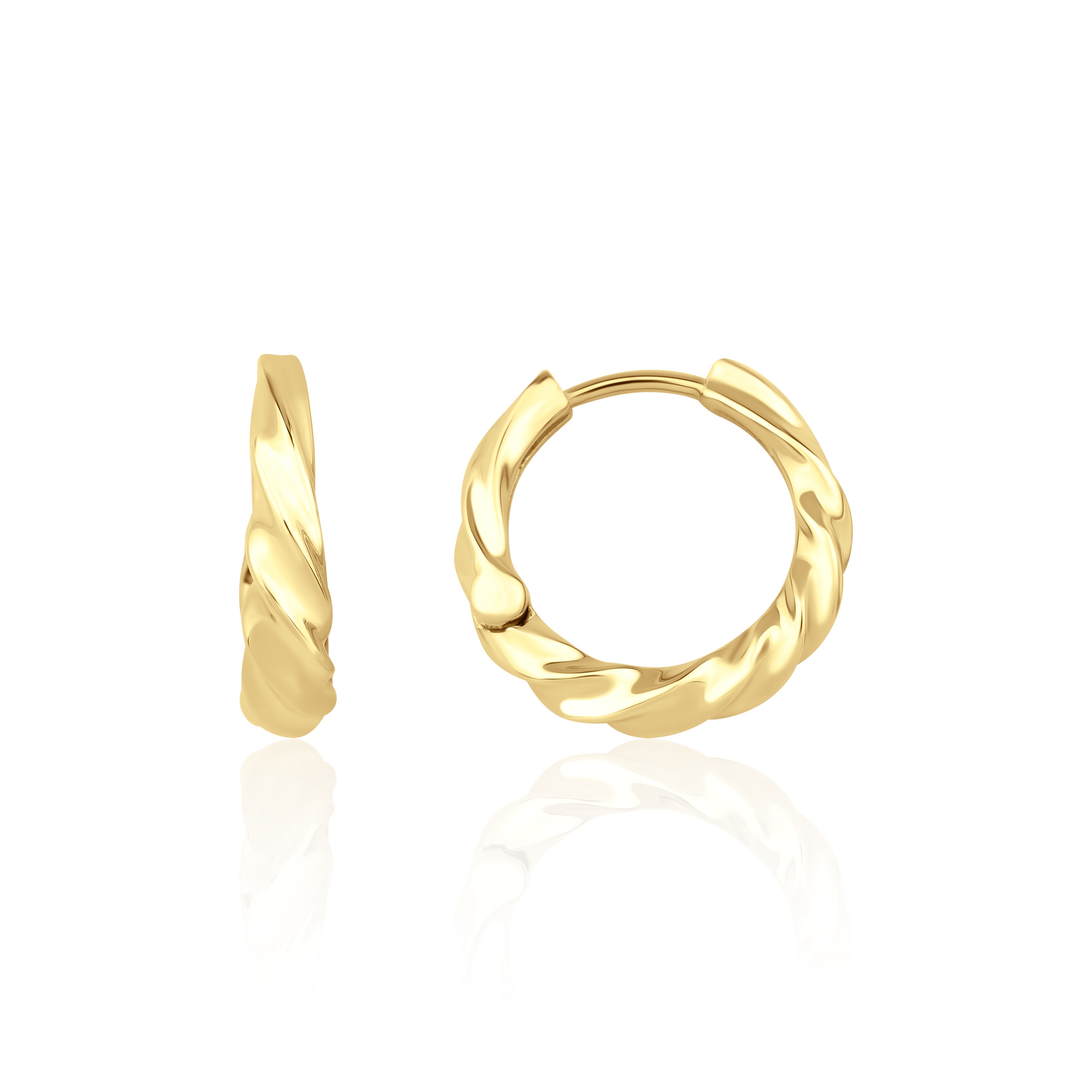 yellow gold twist huggie earrings on white background