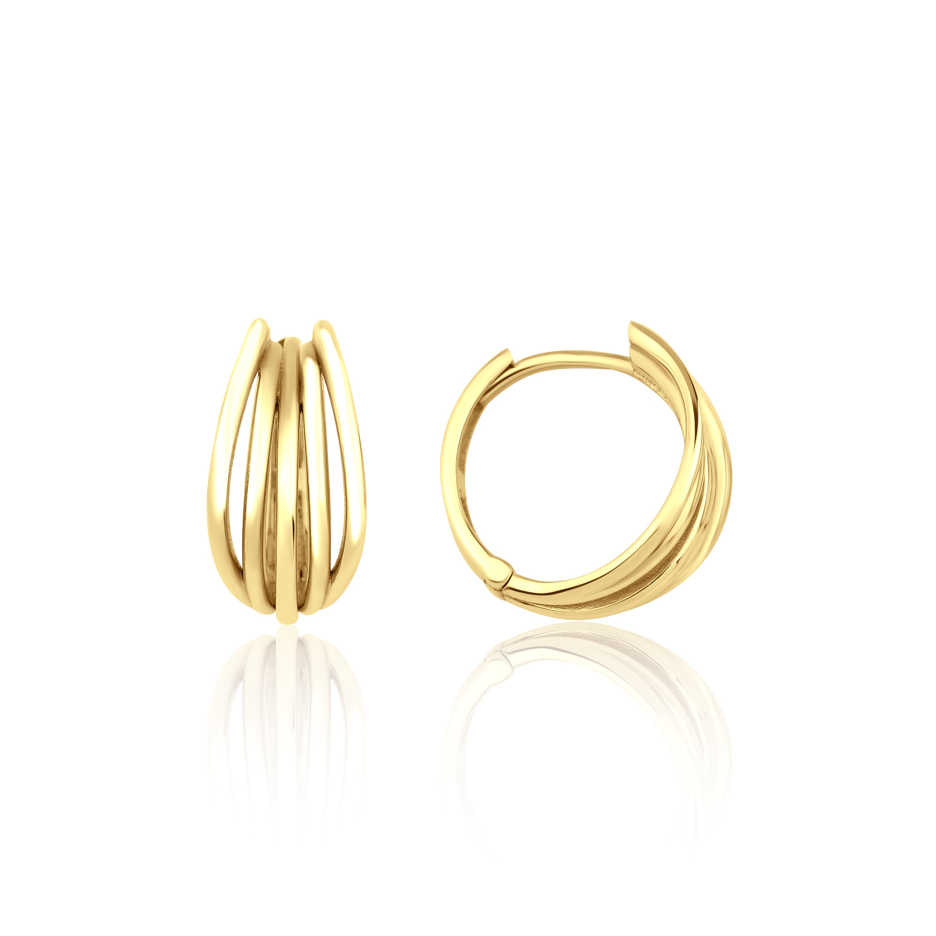 yellow gold arc huggie earrings on white background