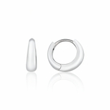 white gold volume huggie earrings on white background