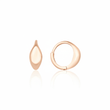 rose gold curve huggie earrings on white background