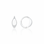 white gold curve huggie earrings on white background
