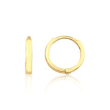 yellow gold flat edge hoop earrings on white background