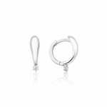 white gold tapered spark huggie earrings on white background