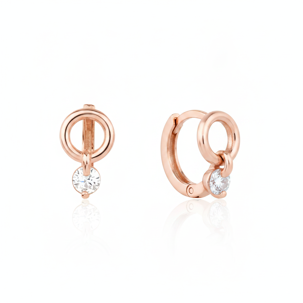 rose gold circle drop huggie earrings on white background