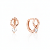 rose gold circle drop huggie earrings on white background