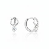 white gold circle drop huggie earrings on white background
