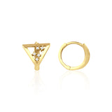 yellow gold triangle huggie earrings on white background