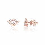 rose gold chevron stud earrings on white background