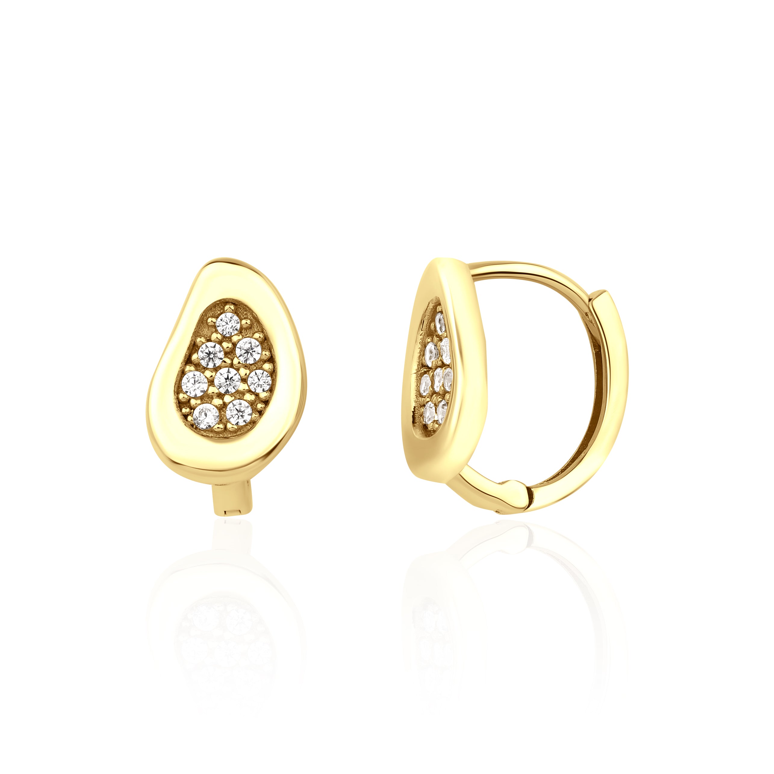 yellow gold teardrop huggie earrings on white background