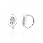 white gold teardrop huggie earrings on white background