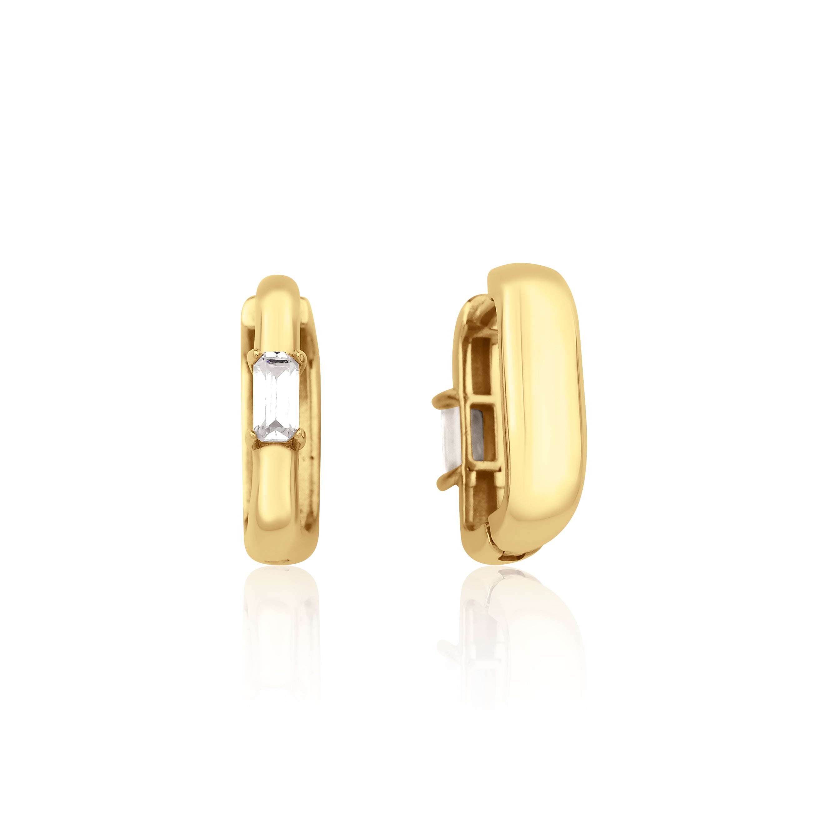yellow gold baguette huggie earrings on white background