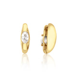 yellow gold oval stone huggie earrings on white background