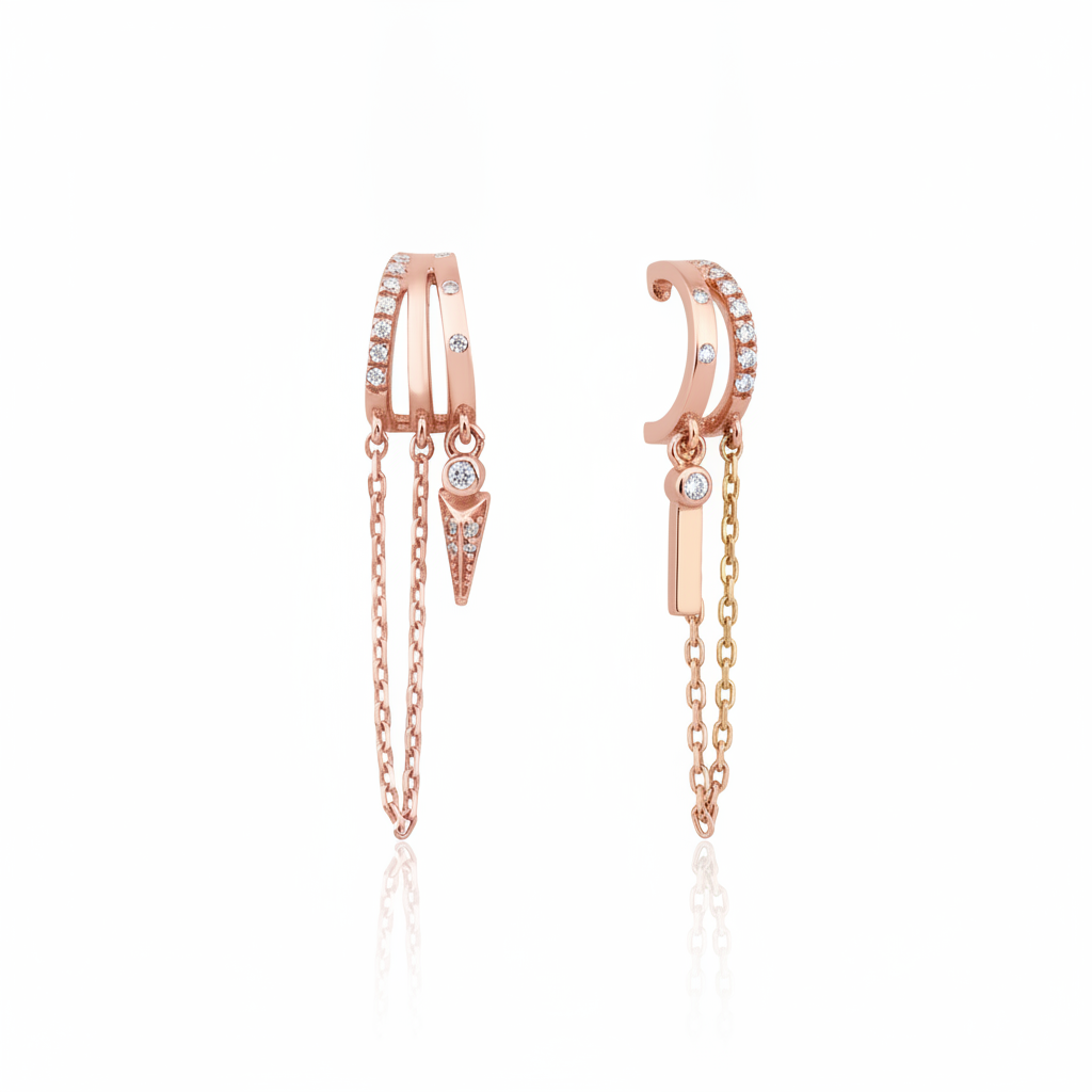 rose gold cuff chain earrings on white background