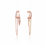 rose gold cuff chain earrings on white background