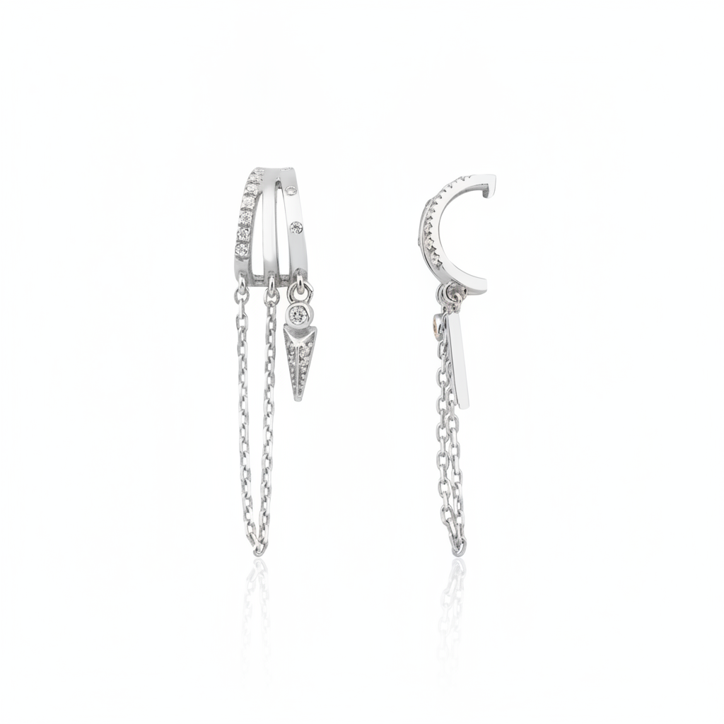 white gold cuff chain earrings on white background