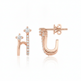 rose gold double arch earrings on white background