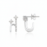 white gold double arch earrings on white background