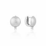 white gold brushed disc huggie hoop earrings with a single clear stone on white background
