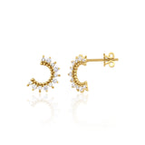 yellow gold crescent stud earrings with clear stones on white background