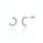 white gold crescent stud earrings with clear stones on white background