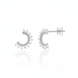 white gold crescent stud earrings with clear stones on white background