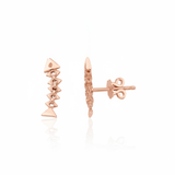 rose gold articulated fishbone stud earrings on white background