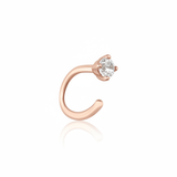 rose gold open curve stud earrings with a single clear stone on white background