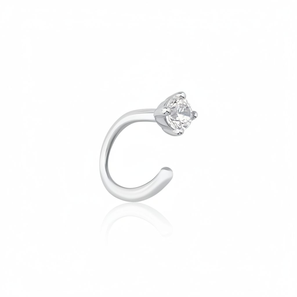 white gold open curve stud earrings with a single clear stone on white background