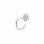 white gold open hoop earring with a floral cluster of clear stones on white background