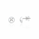 white gold star-etched dome stud earrings with a single clear stone on white background