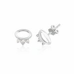 white gold open oval stud earrings with three clear stones on white background